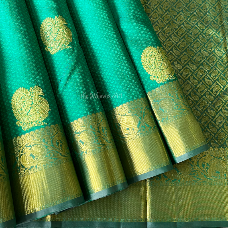 Green Kanchipuram Silk Saree with Anna Pakshi motifs