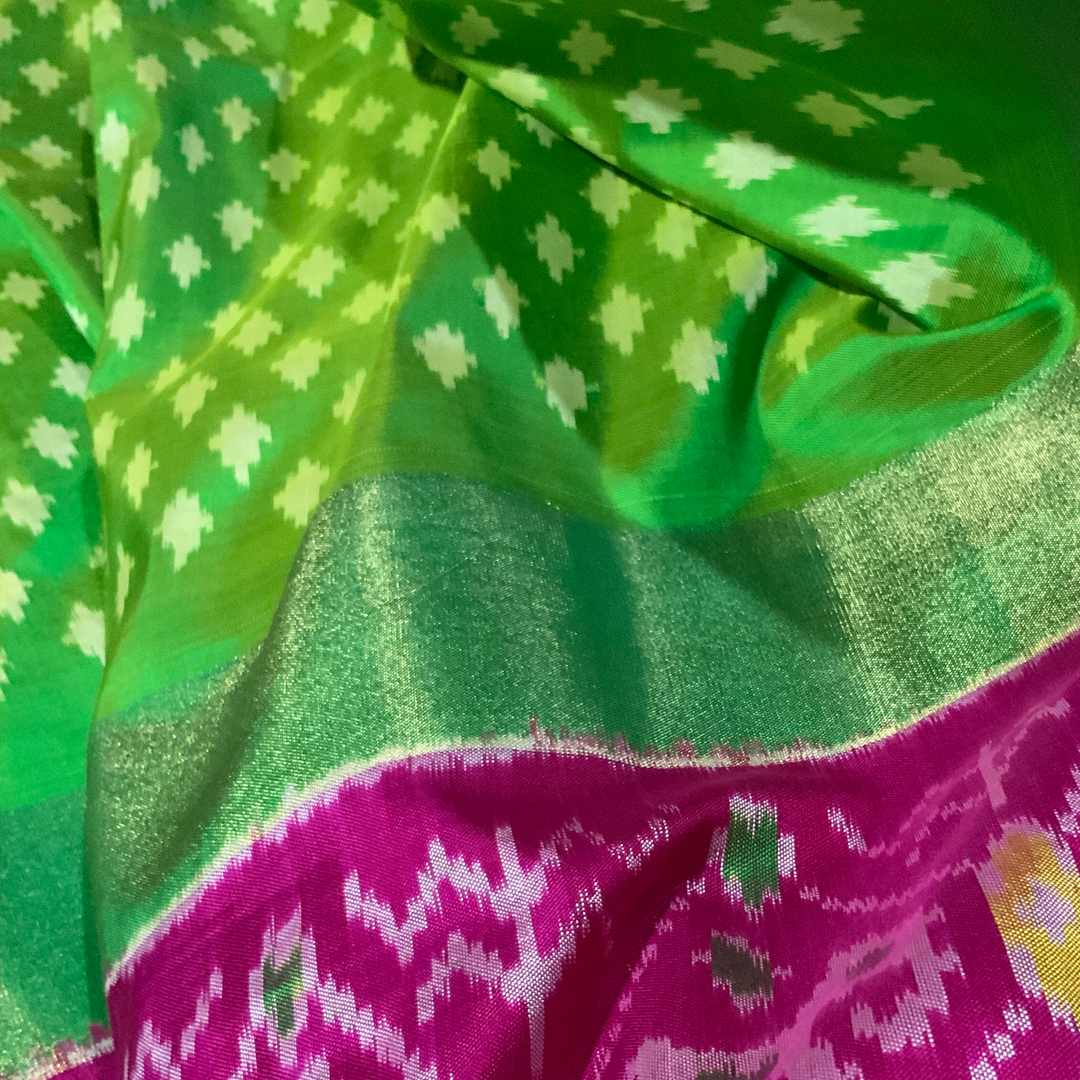 Pochampally ikkat blue and green handwoven pure silk saree with flower  motifs